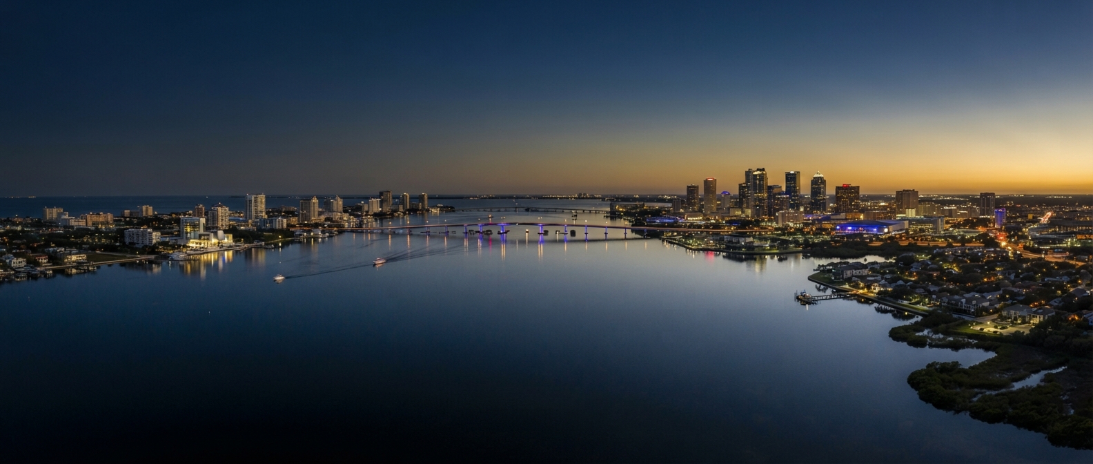 Tampa Bay luxury home at golden hour framing the buyer-timing decision